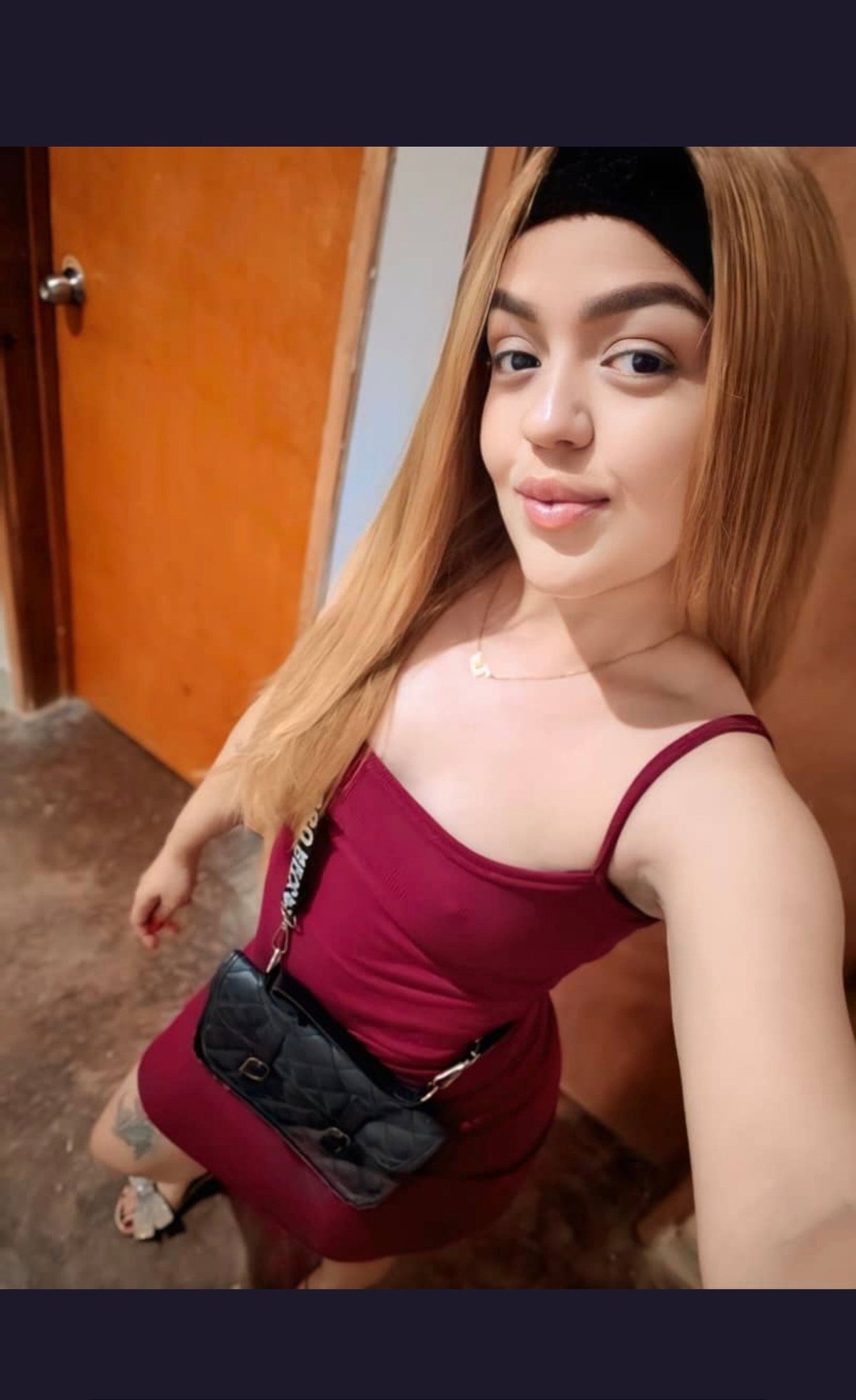 Sierra in burgundy tank top