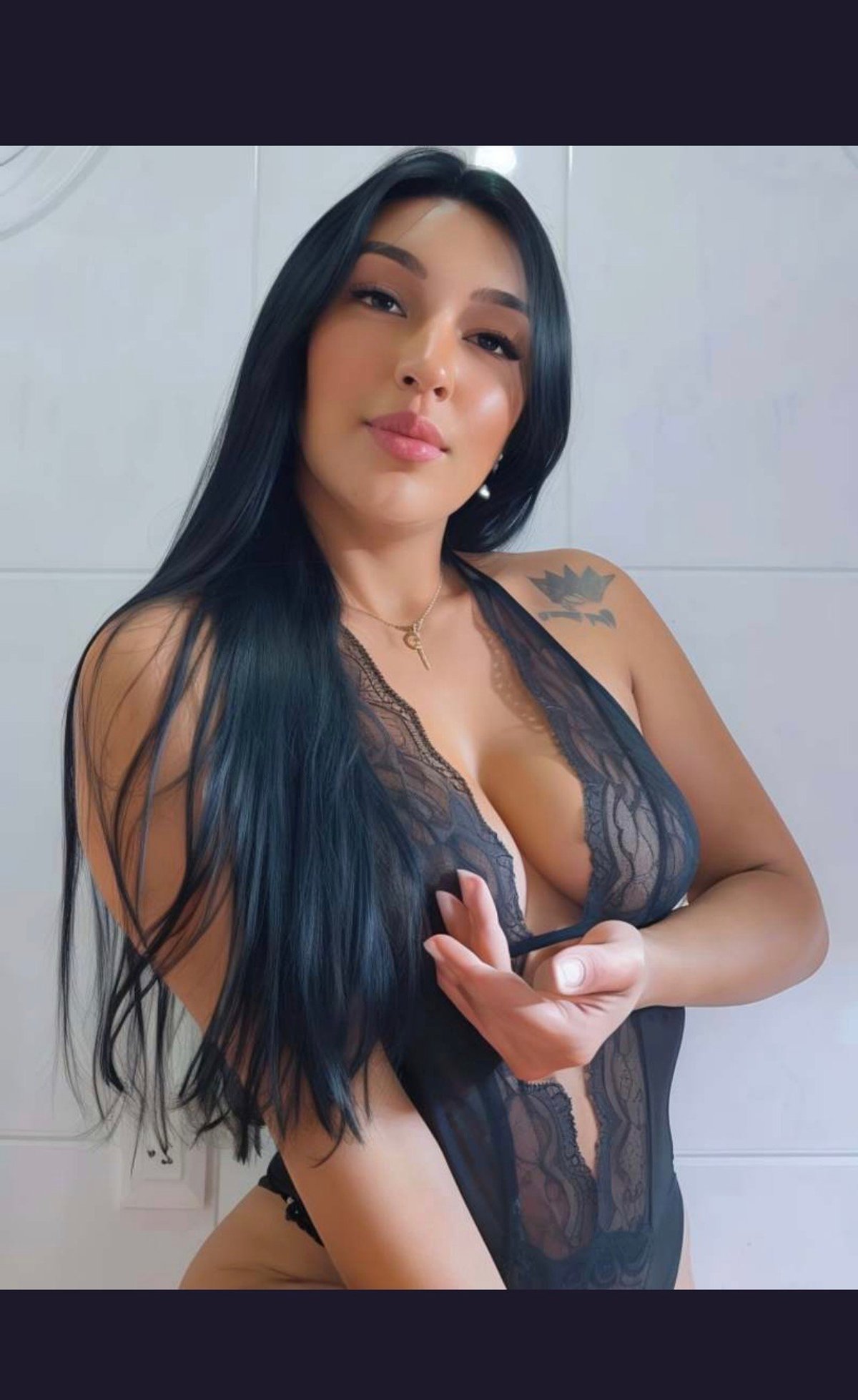 Mila in black lace bodysuit