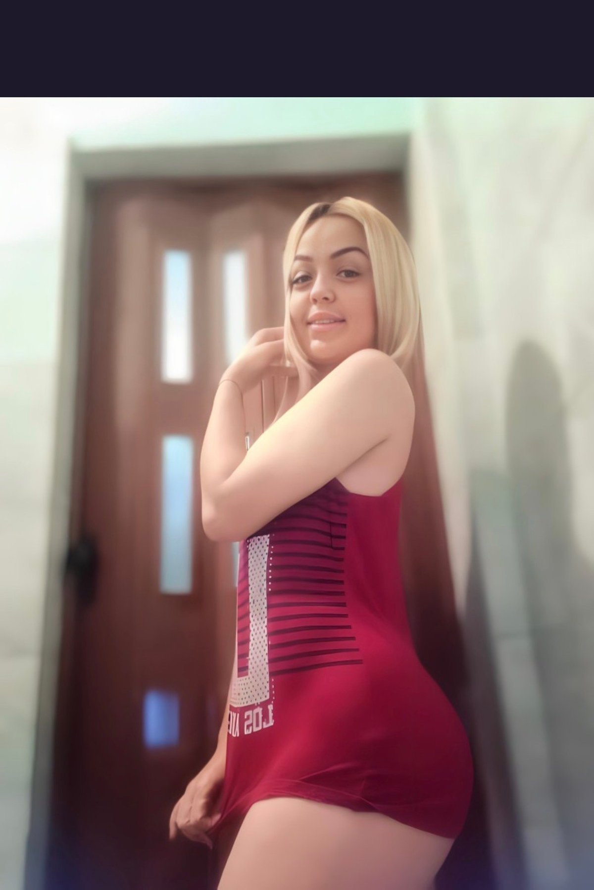 Sierra in red tank top