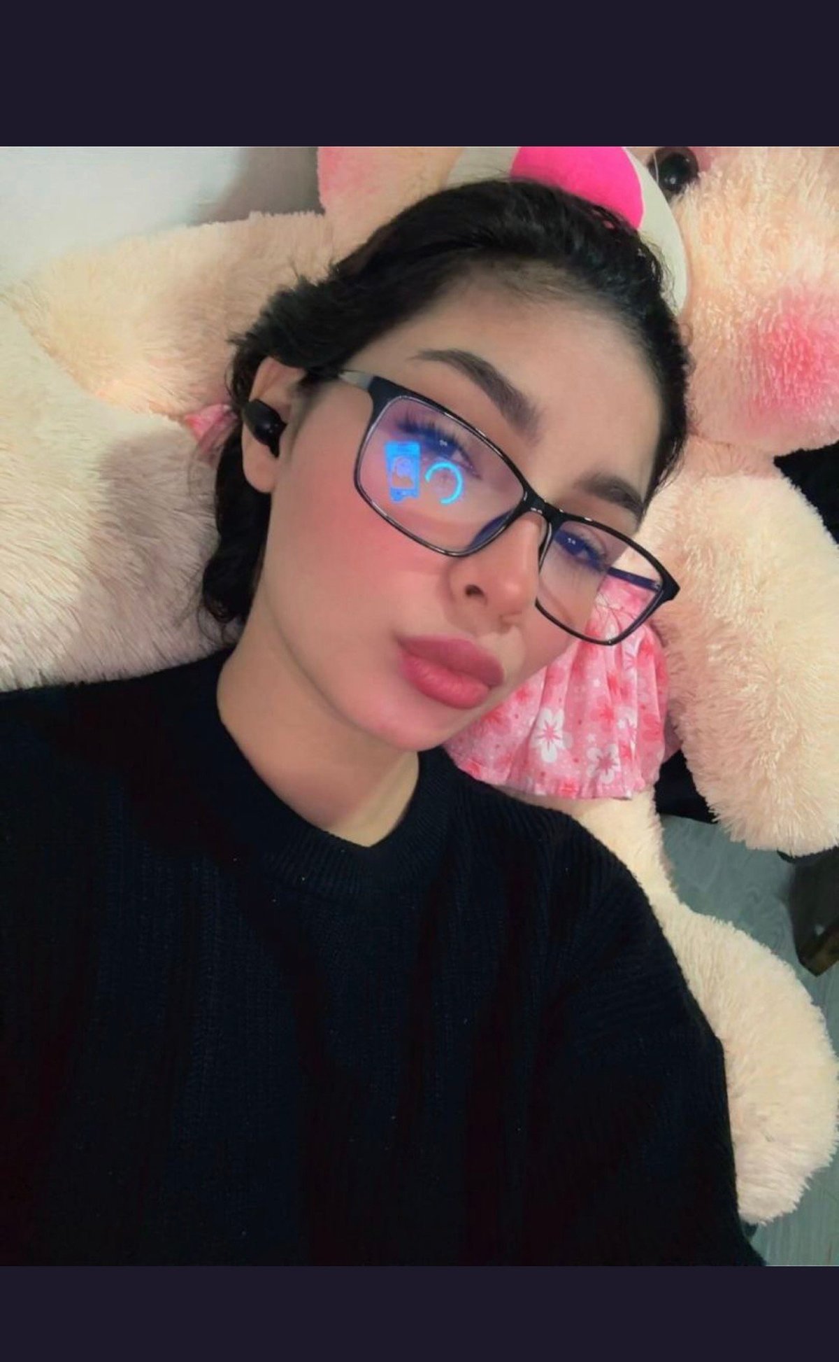 Brynn in black shirt and glasses